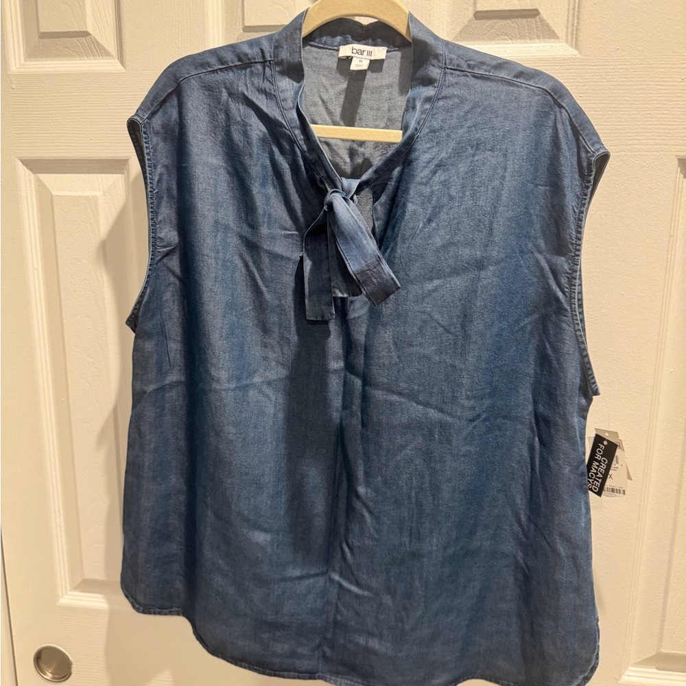 Women’s sleeveless denim blue blouse